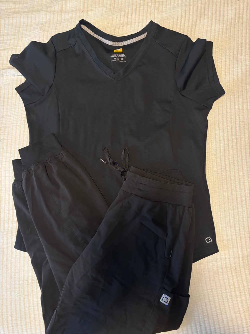 2 pairs of scrubs